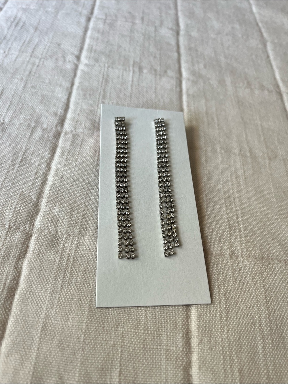 Silver tones rhinestone dangle earrings